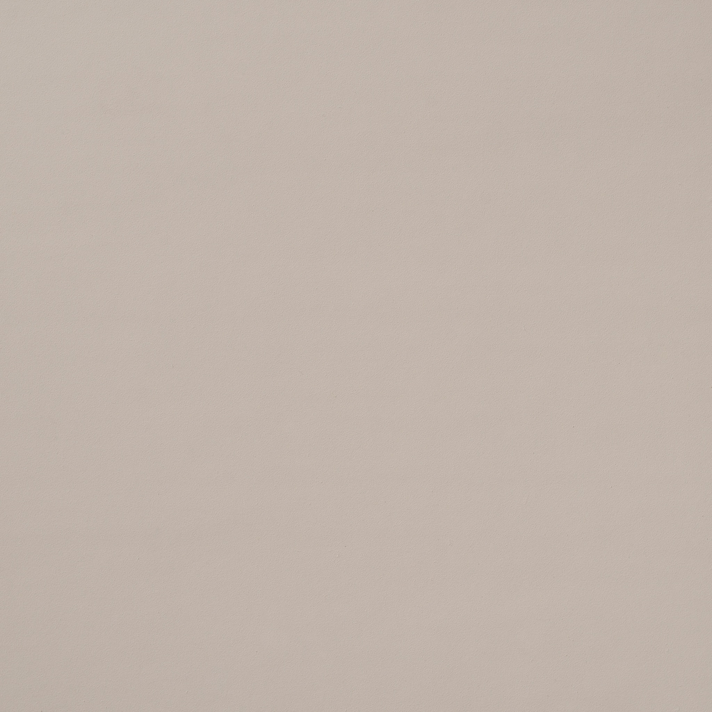 Un primo piano della trama di una carta bianca.