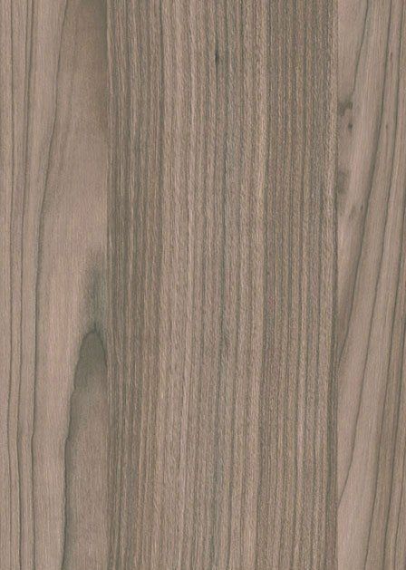 Un primo piano di un pezzo di legno che ne mostra la venatura e la consistenza.
