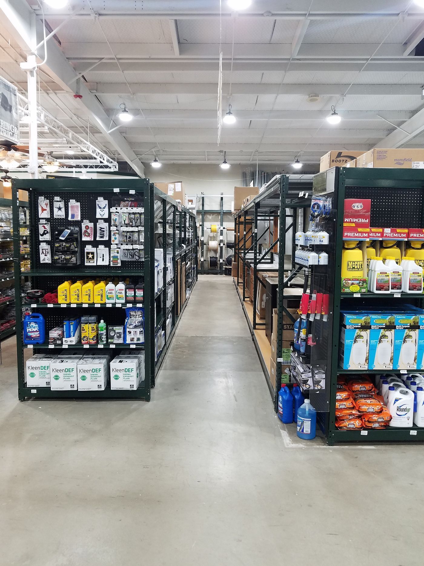 A warehouse filled with lots of shelves filled with lots of products.