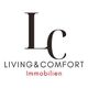 LC Living&Comfort Immobilien logo with black initials and red “Immobilien” text on a white background