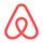 Red Airbnb logo icon on a white background