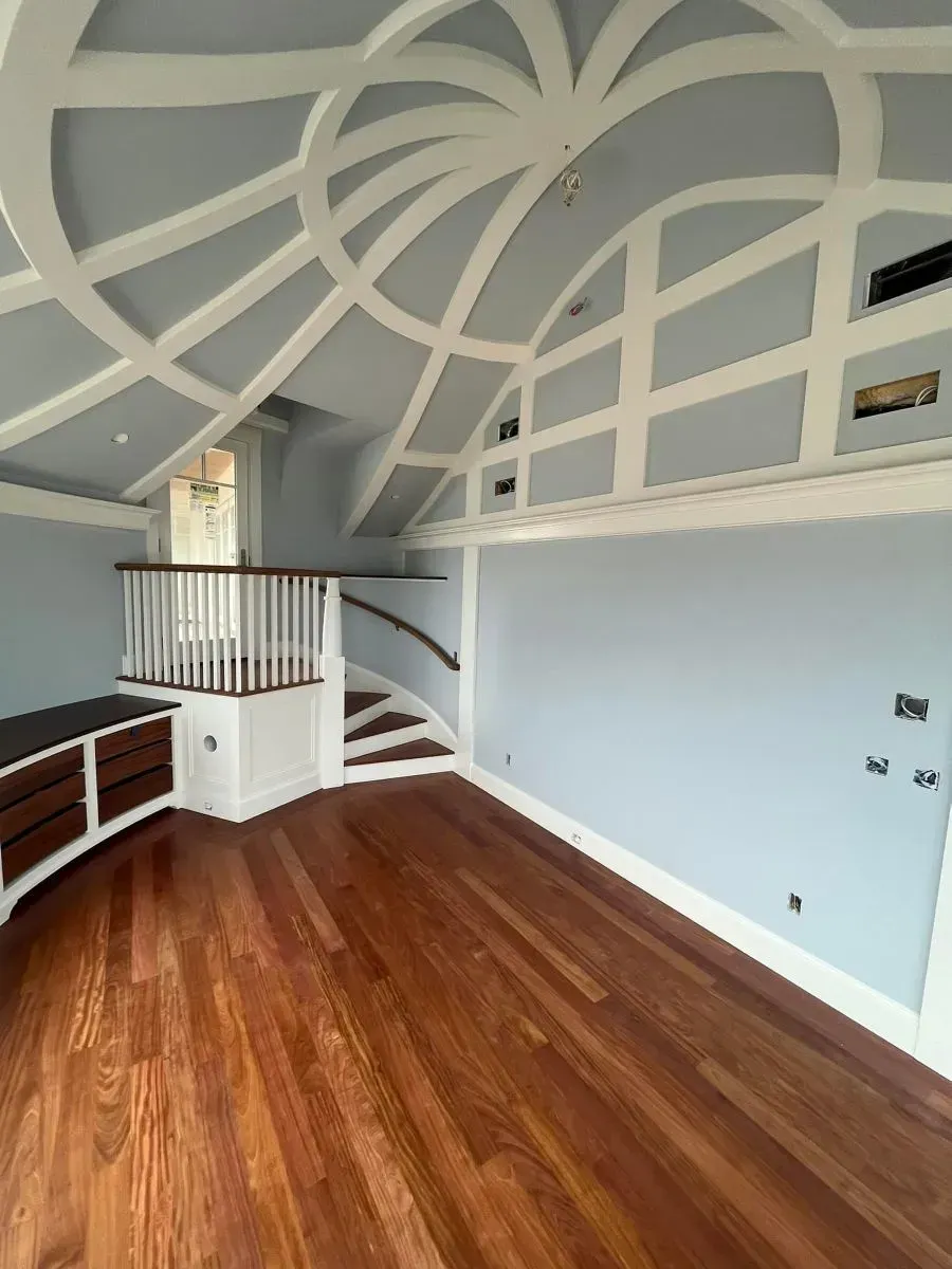 There is a staircase in the middle of the room.