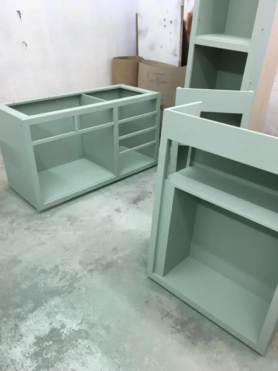 A couple of shelves sitting on top of a concrete floor