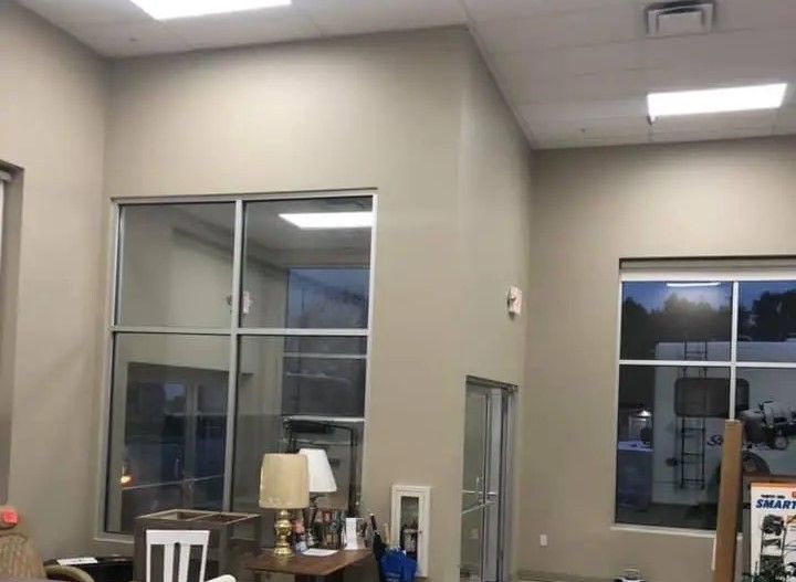 A garage with a concrete floor and a door.