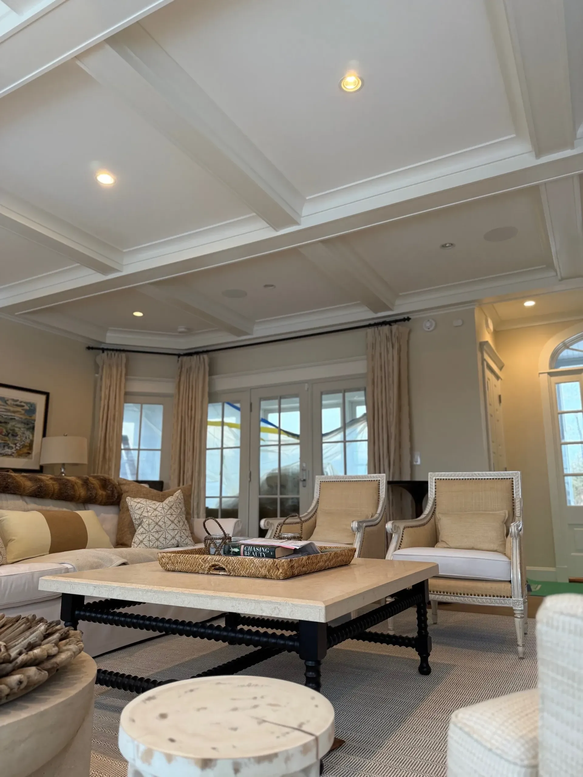 A living room filled with furniture and a coffee table.