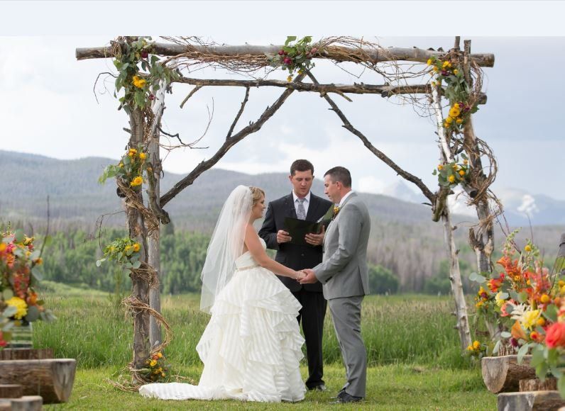 man and wife saying their vows in front of the Officiant