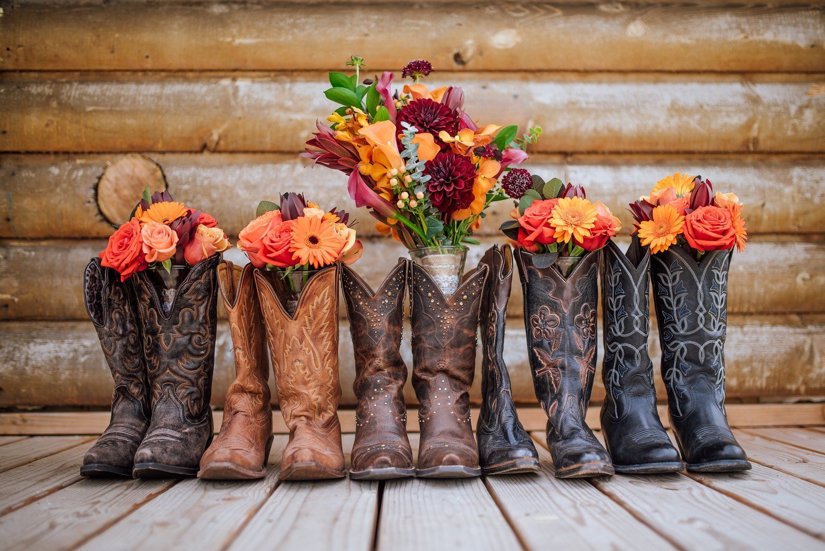cowboy woman boots with bouquet of flowers