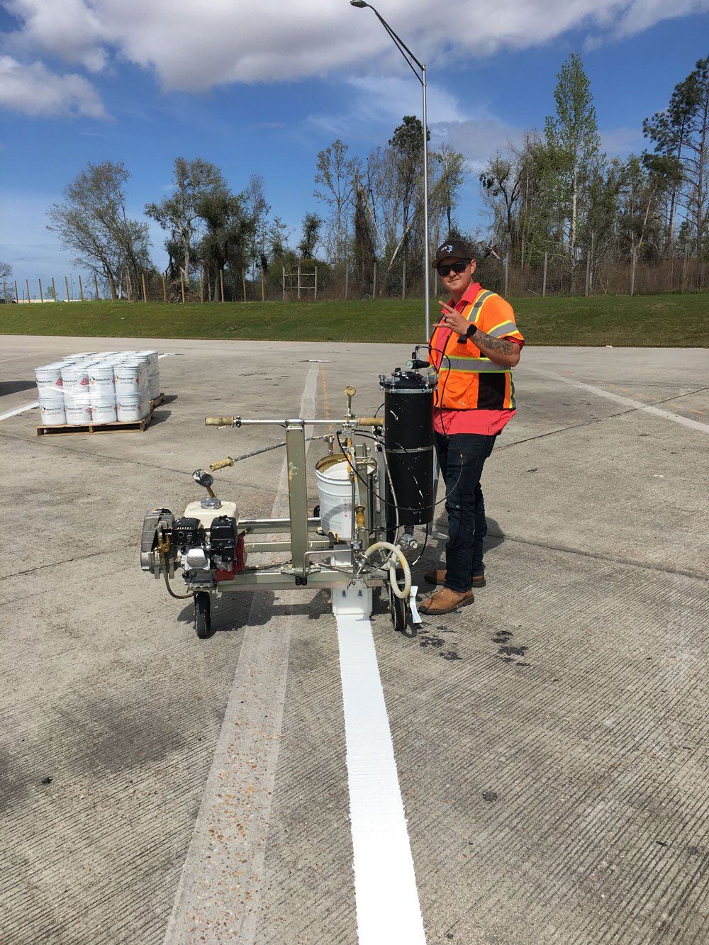 Man Working on The Parking Lot — Pensacola, FL — Emerald Coast Striping