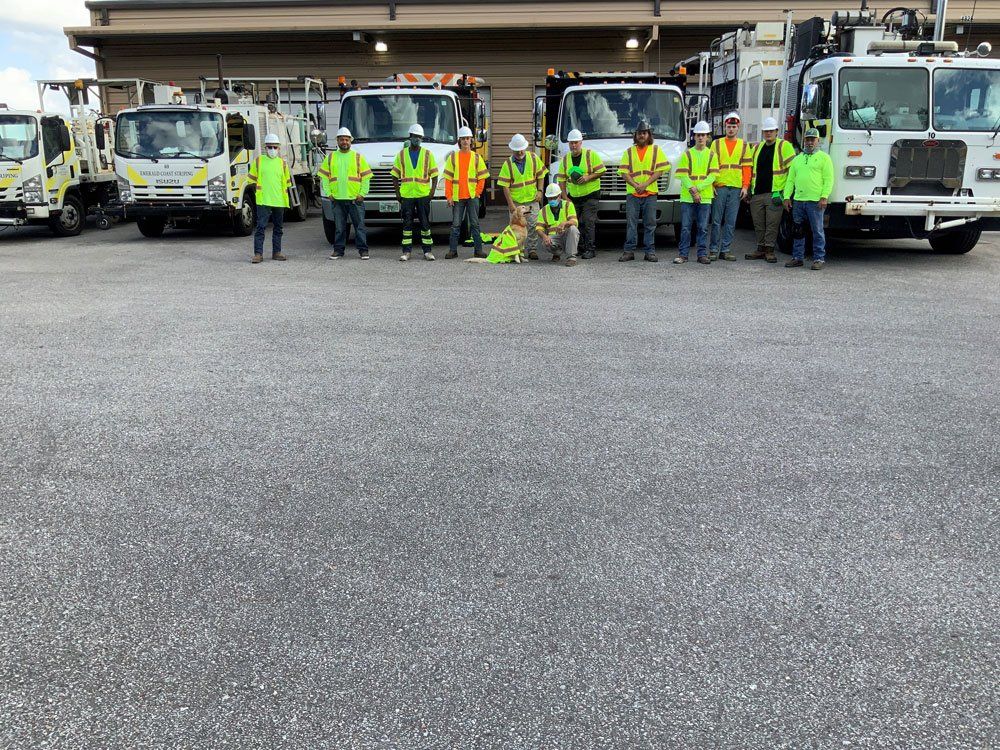Men Wearing Safety Vest — Pensacola, FL — Emerald Coast Striping