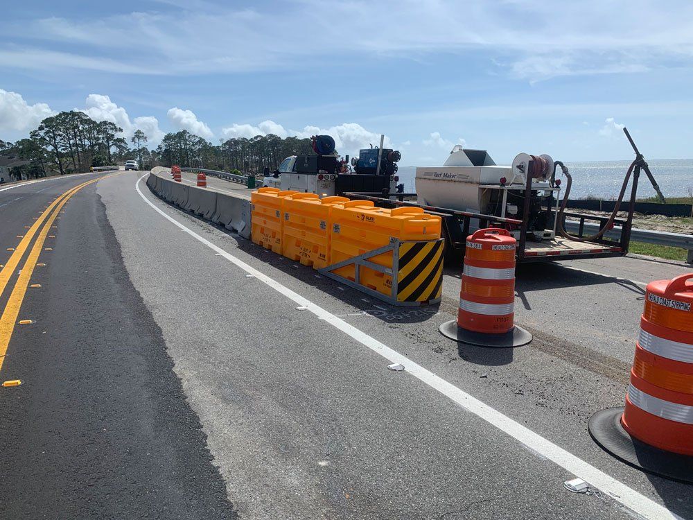 Traffic Barriers and Barrels — Pensacola, FL — Emerald Coast Striping
