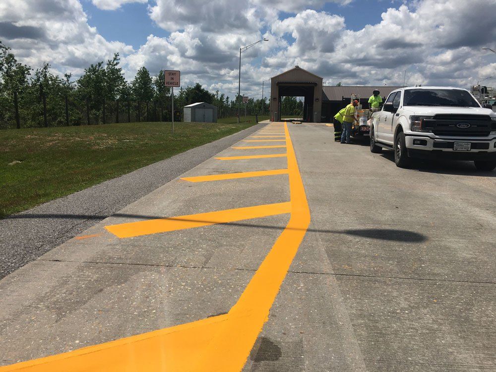 Parking Lot with Yellow Lines — Pensacola, FL — Emerald Coast Striping