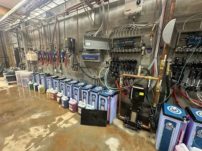 A room filled with lots of electrical equipment and chemicals.