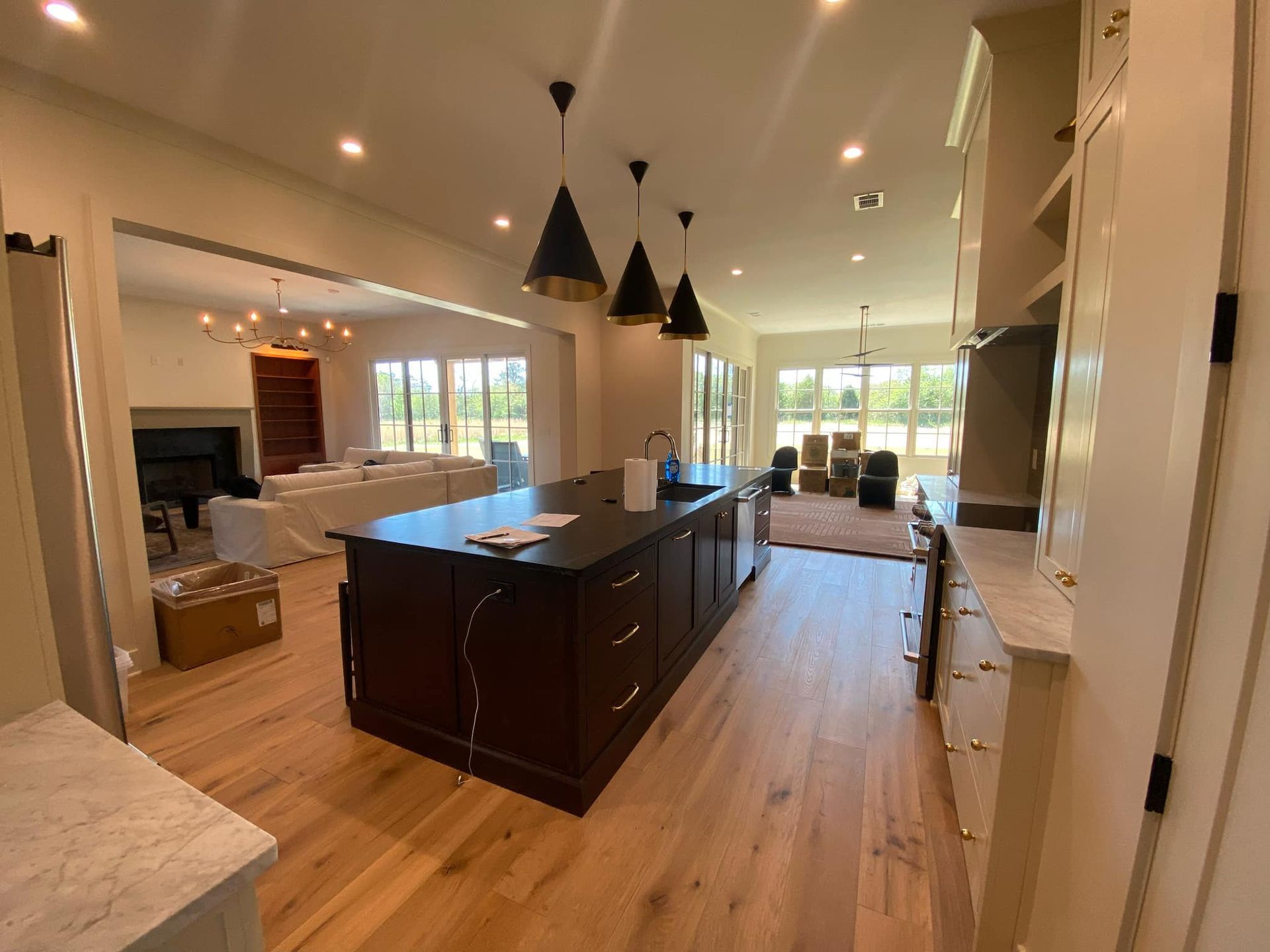 A kitchen with a large island in the middle of the room.