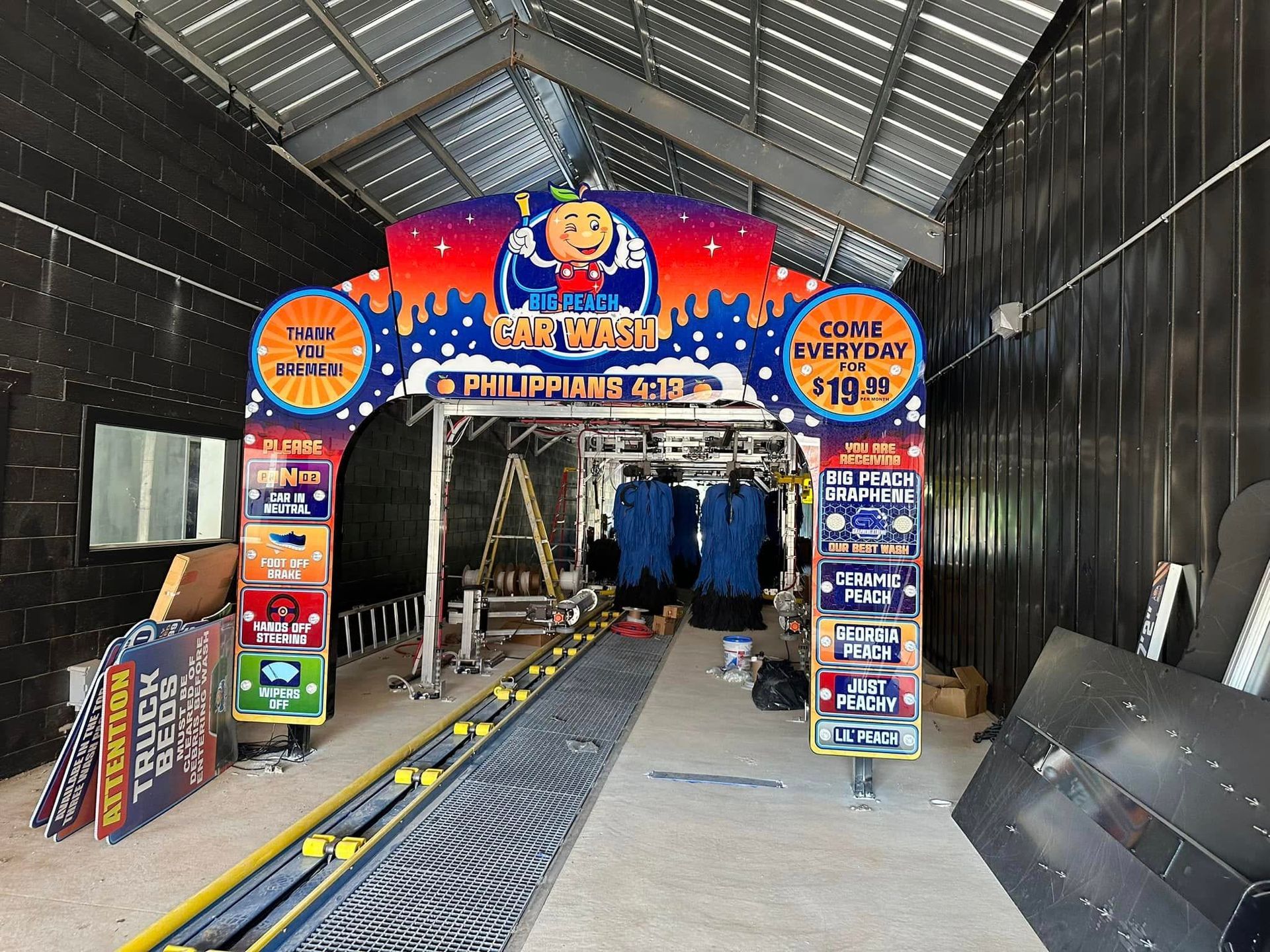 A car wash is being built inside of a building.
