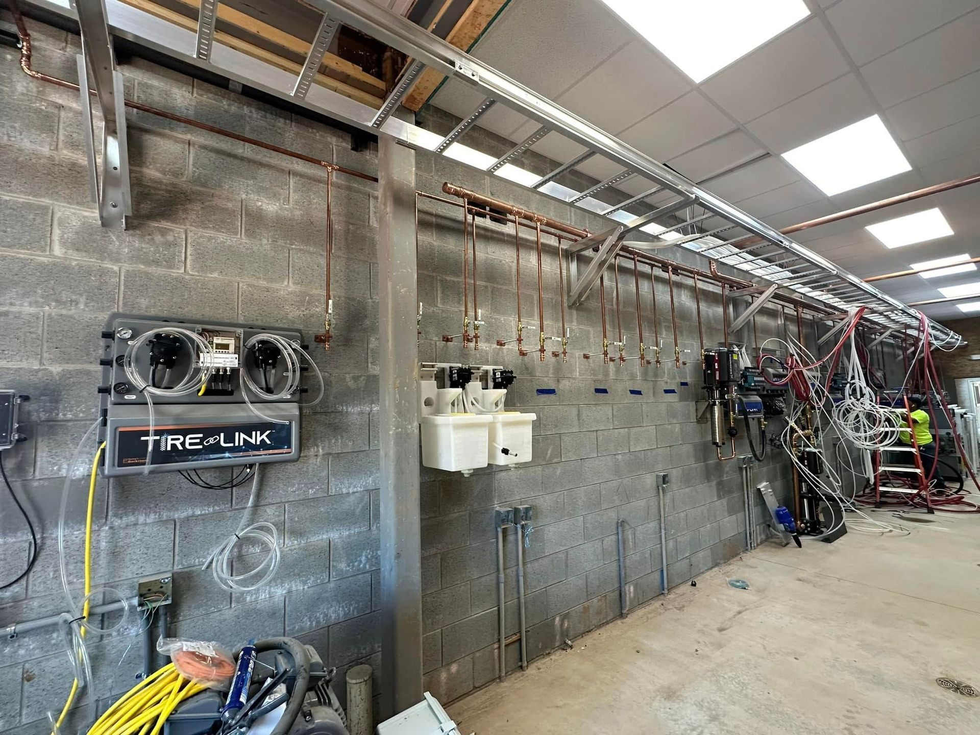 A brick wall with a clock on it that says time link