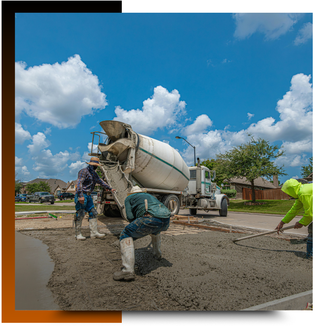 Men working on the concrete pavement