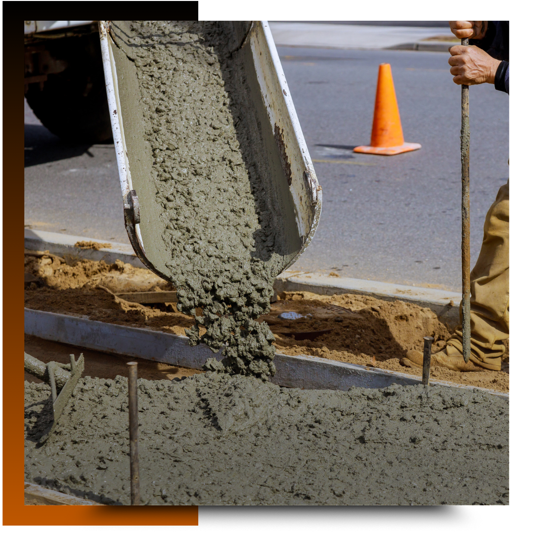 Men working on the sidewalk concrete