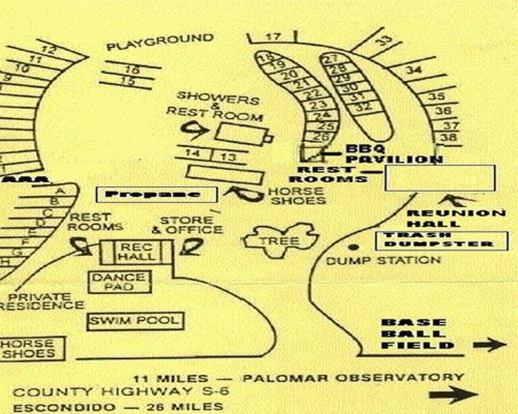 Map of a campground with labeled amenities like playground, showers, and a baseball field.