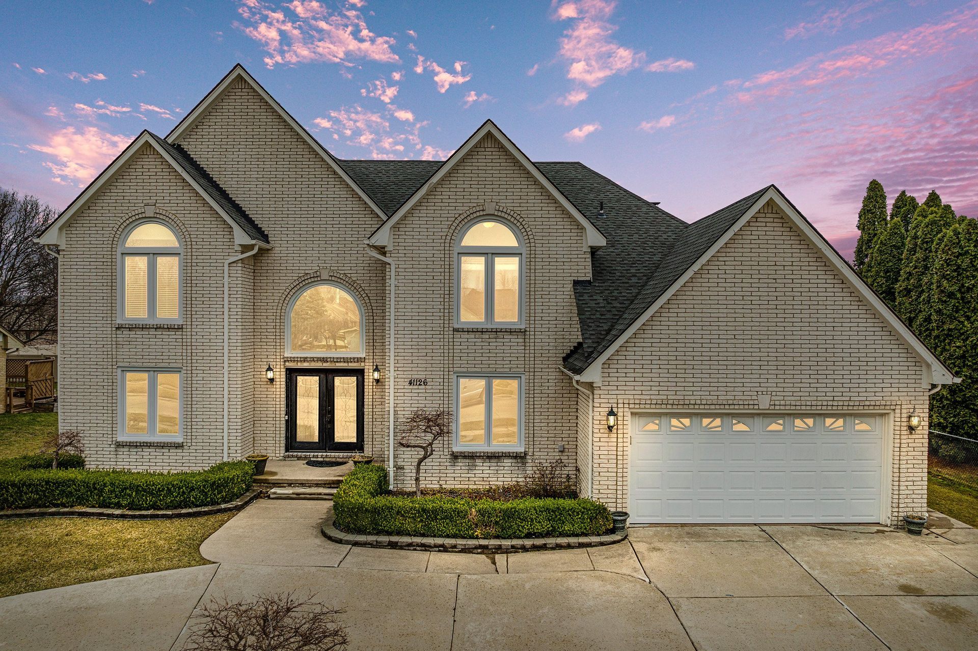 Sterling Heights Real Estate Photography - White brick colonial with 2-story entrance