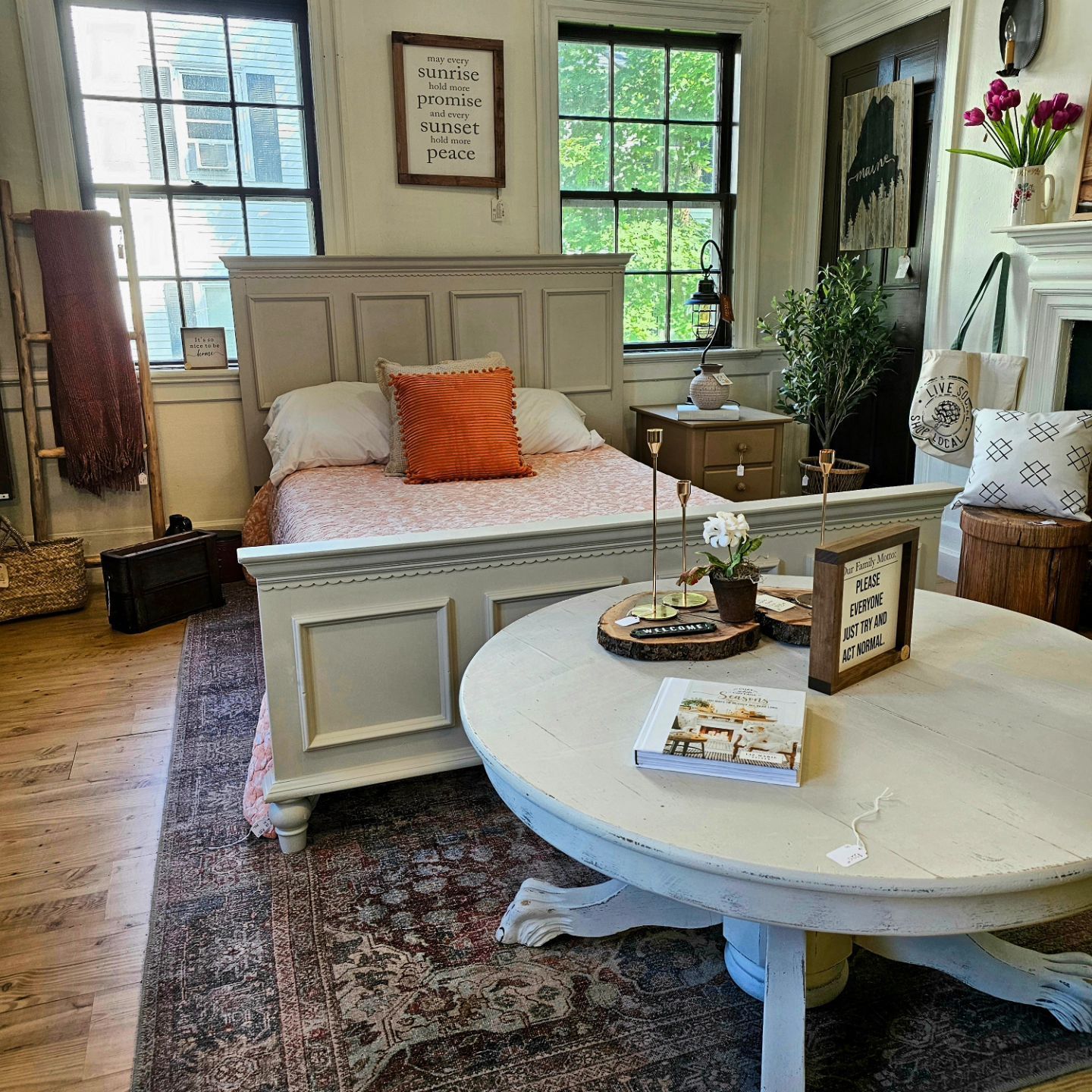 A bedroom with a bed and a coffee table