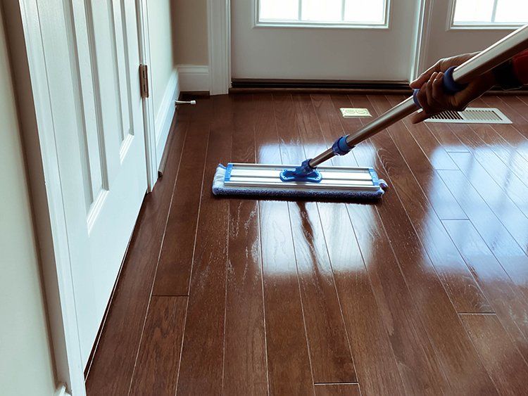 Mopping the Hardwood Floor — Winfield, KS — Ark Valley Cleaning