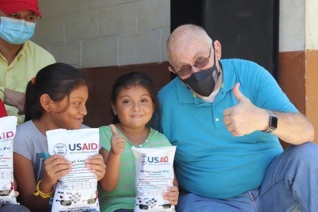 CEO, Michael Ryer, distributes food in Guatemala