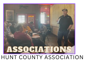 a man standing in front of a group of people with the words associations hunt county association below him
