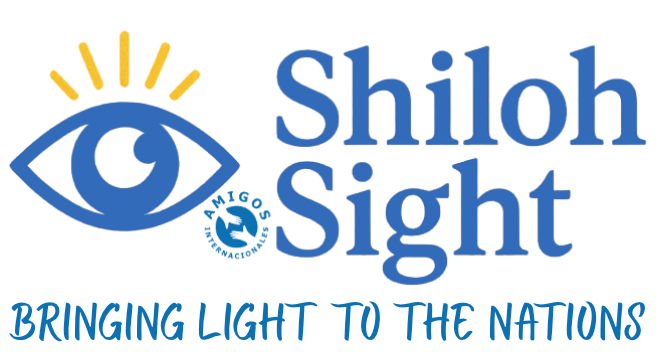 Logo for Shiloh Sight: Blue eye with radiating yellow light above. 