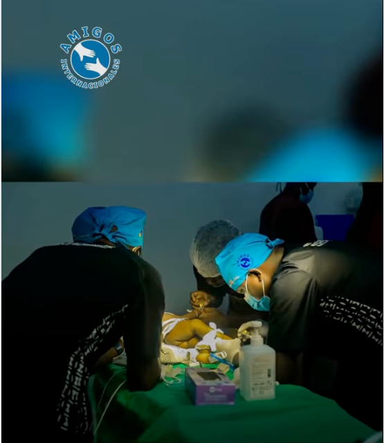 Dr. Paul Mulyamboga performs cleft lip surgery on baby Godfrey at IMC Hospital, Gulu, Uganda