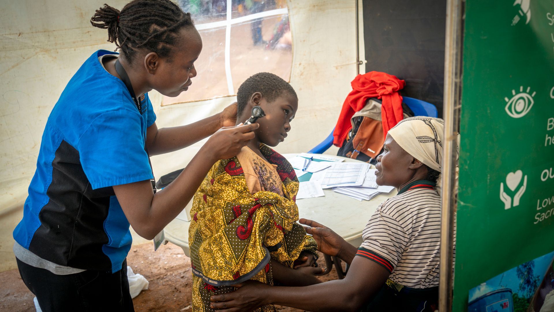 MissionPoint Burundi free medical camp in Gisuru, doctors treating patients