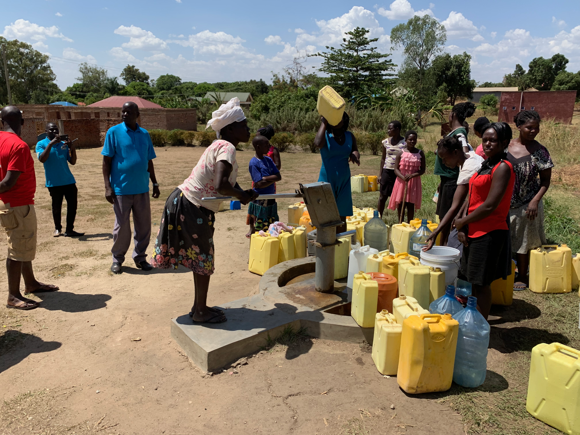 Women in their role in Uganda as the ones to gather the water