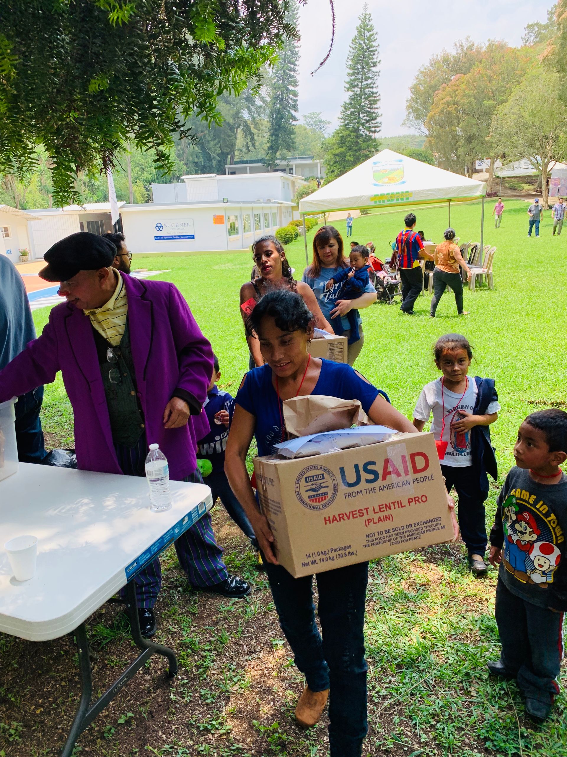 Community distribution of USAID food boxes connected to Amigos Internacionales Guatemala work