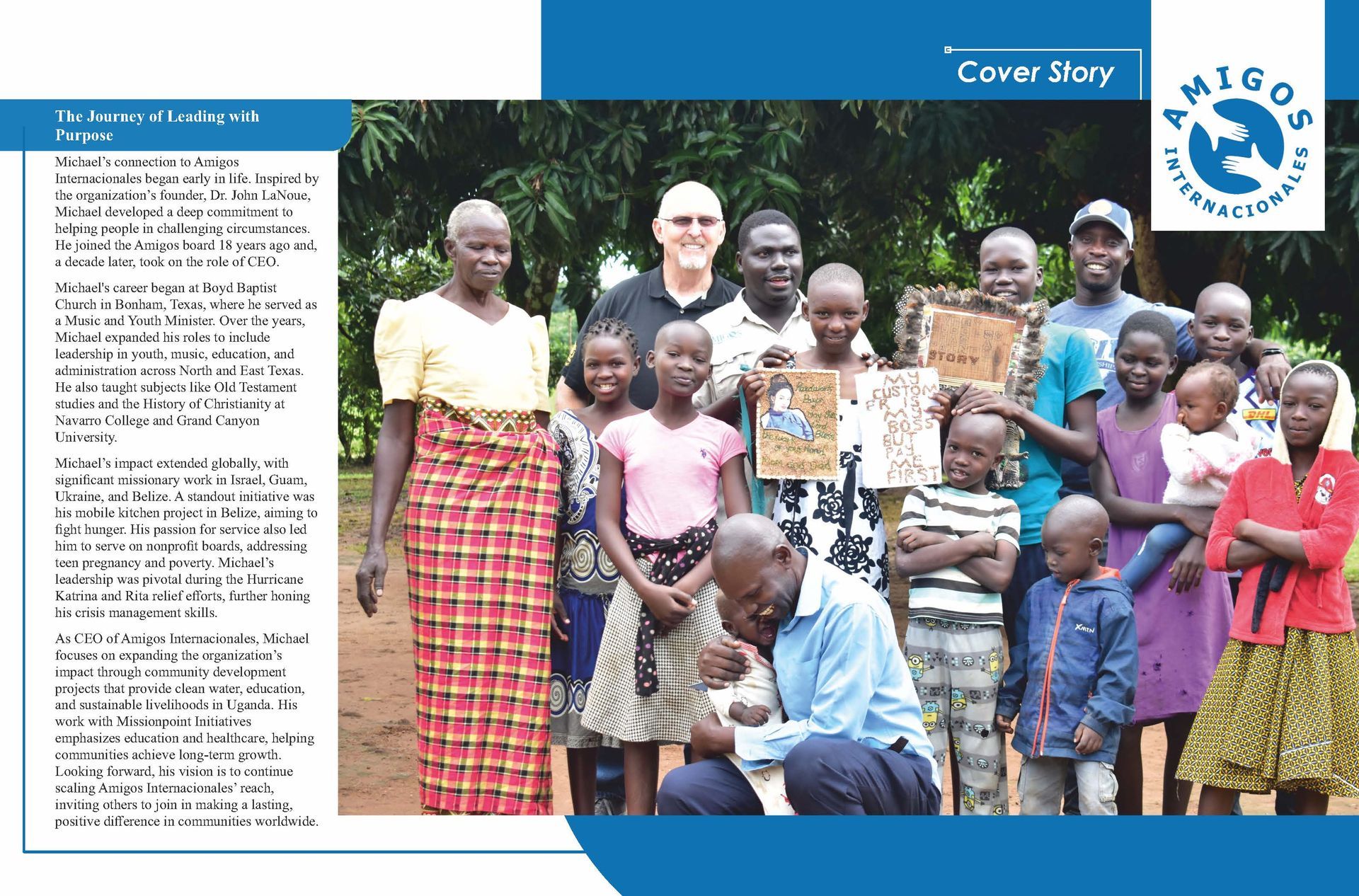 A group of people are posing for a picture with a blue background that says amigos