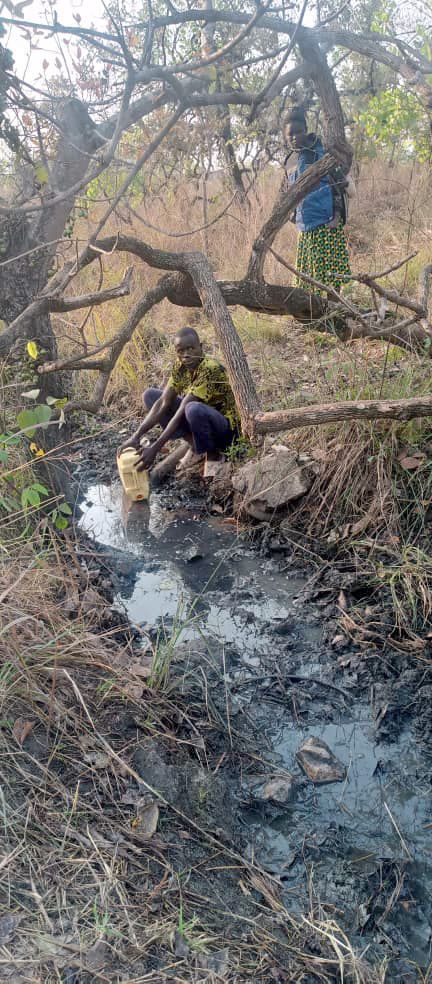 Polluted water source for villages in Uganda