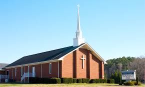 picture of a modern day church with steeple