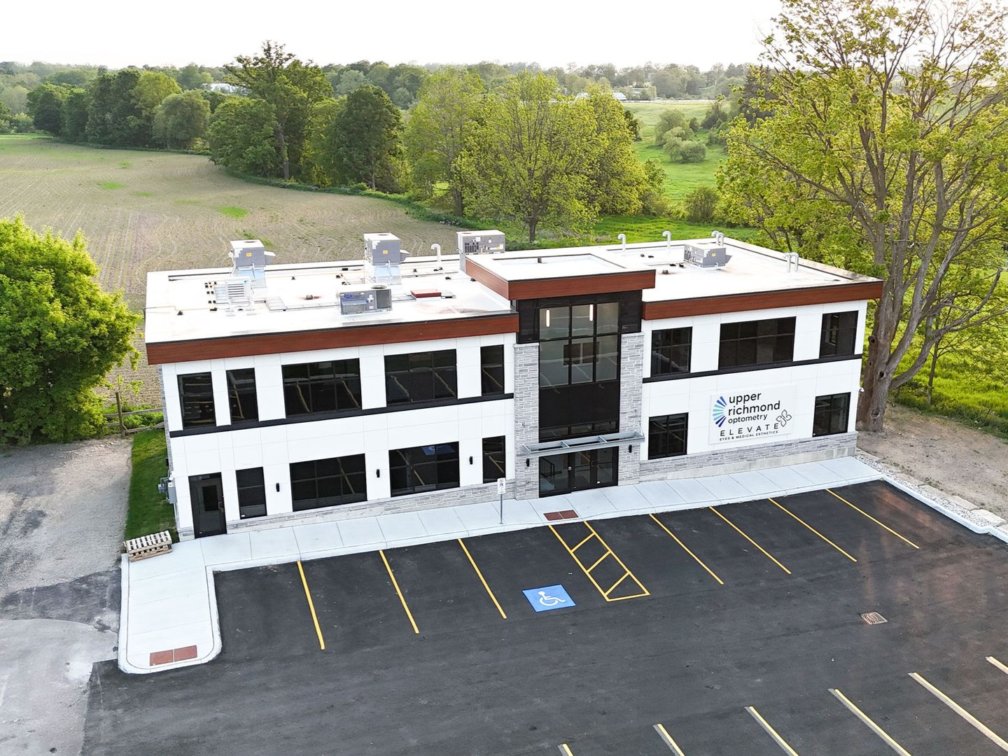 Two-story white building in Arva Ontario