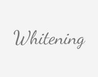 The word whitening is written in cursive on a white background.