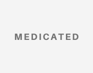The word medicated is on a white background.
