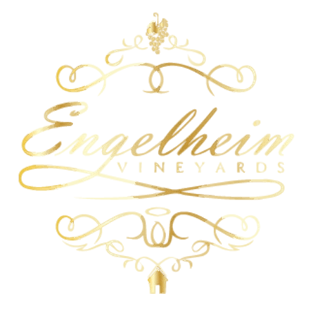A gold logo for engelheim vineyards with a bunch of grapes