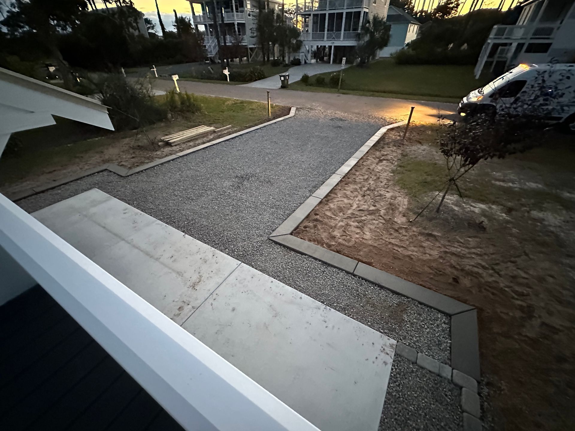 A view of a gravel driveway from a balcony