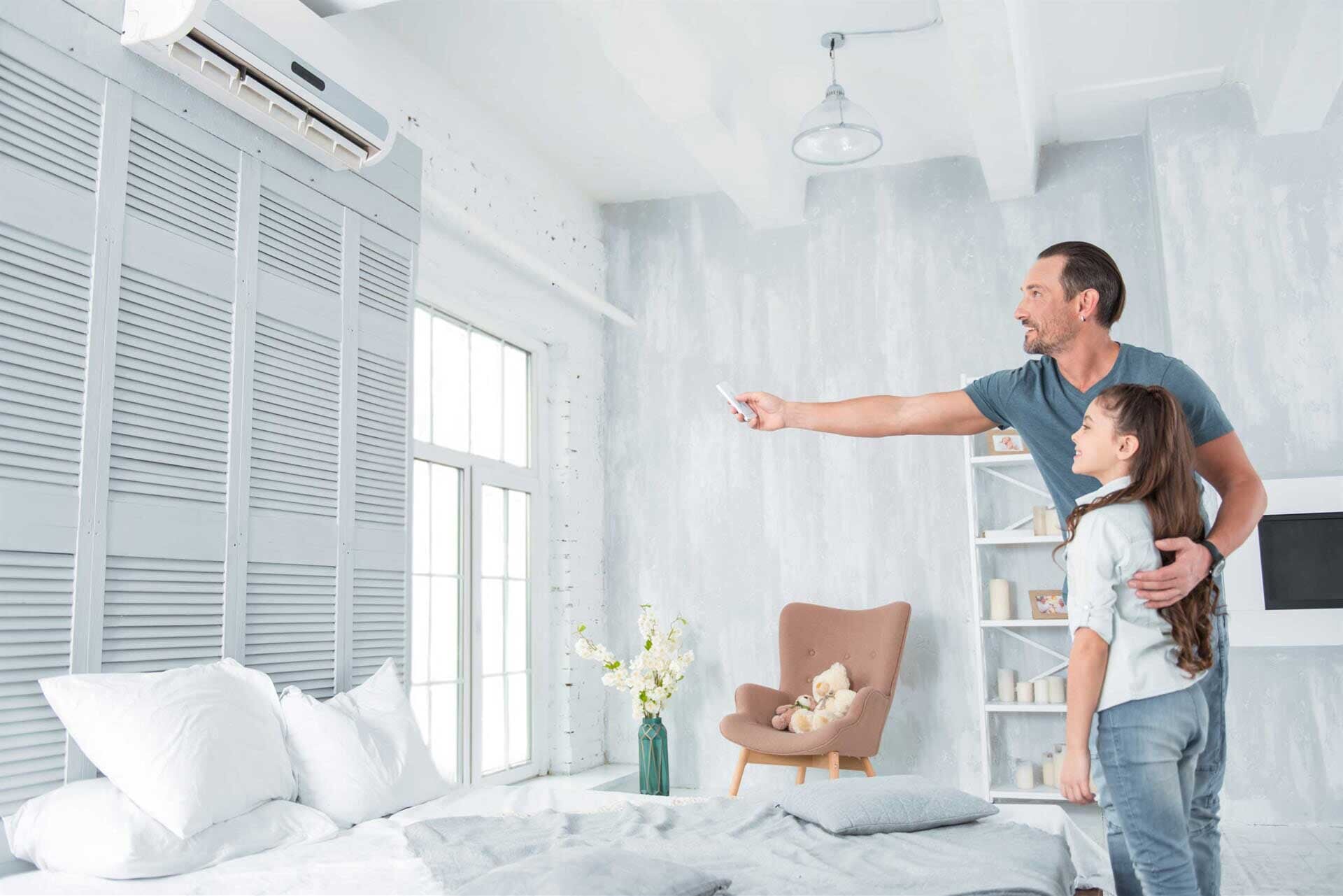Man operating Air Condition — Residential & Commercial Airconditioning Repair in Batemans Bay, NSW