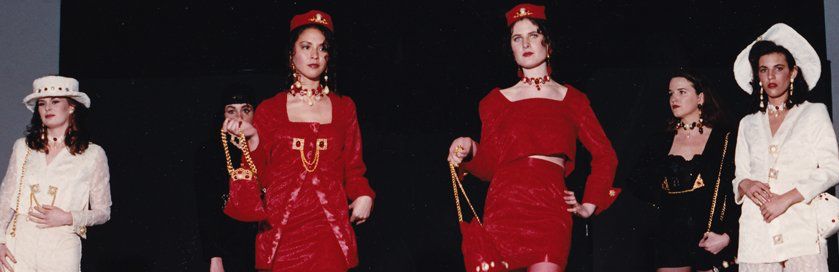 A group of women are standing next to each other on a stage.