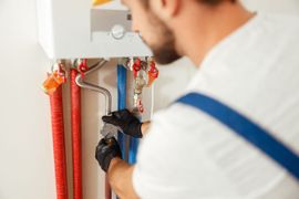 man working with pipes