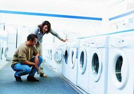 Couple looking for a washing machine - Appliance Repair in Spokane, WA