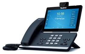 A telephone with a screen on top of it on a white background.