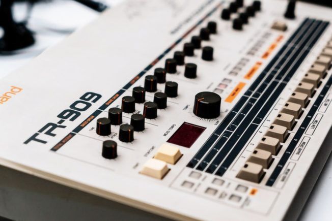 A close up of a roland tr-909 keyboard