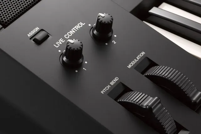 A close up of a keyboard with the word live control on it