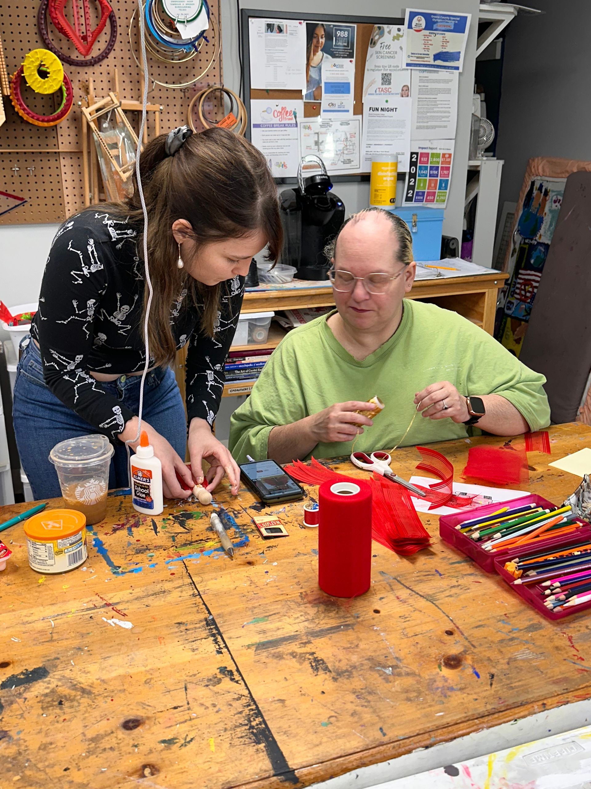 We Care Arts, artist-client Rachel K. and teacher, Emily.