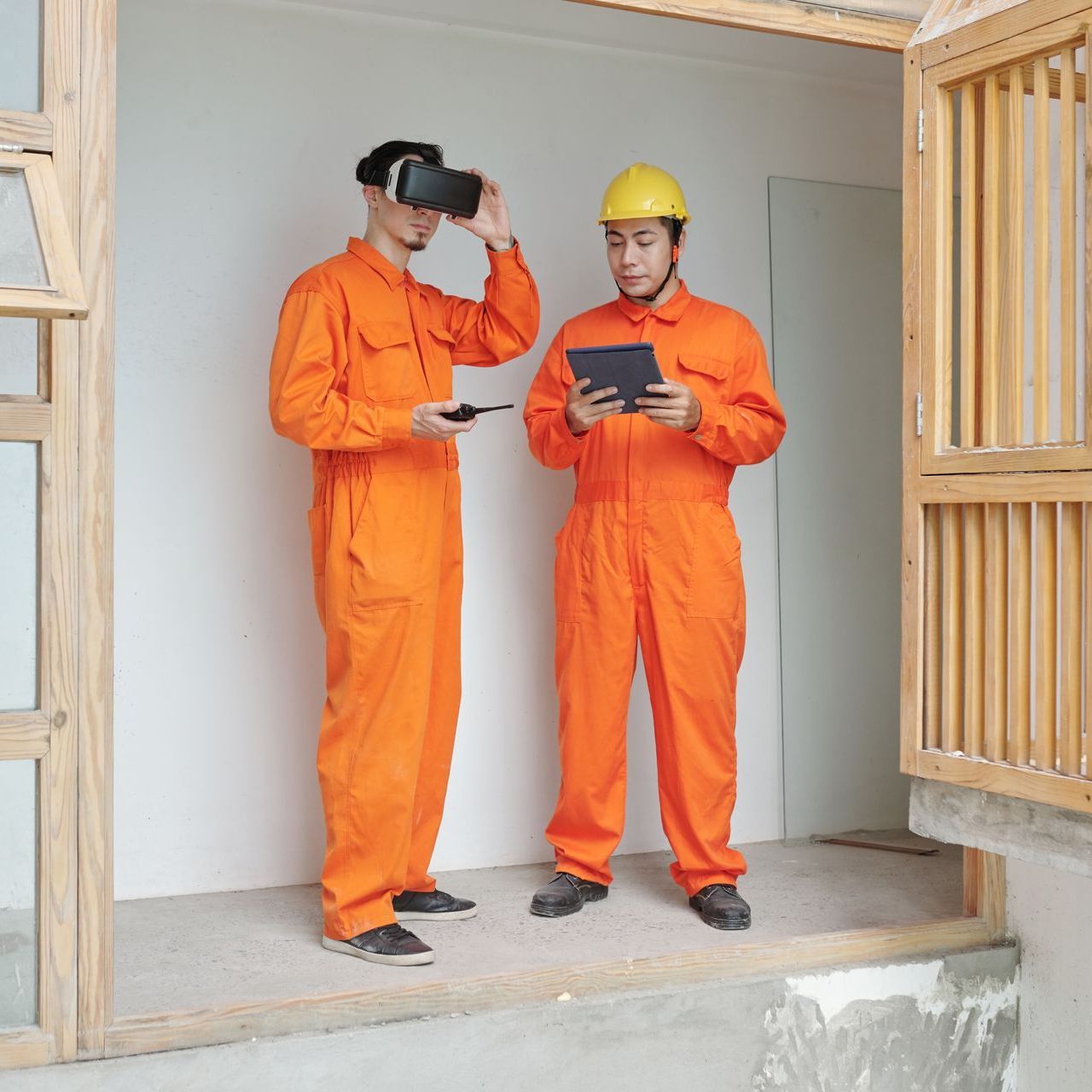 construction workers checking thermal insulation