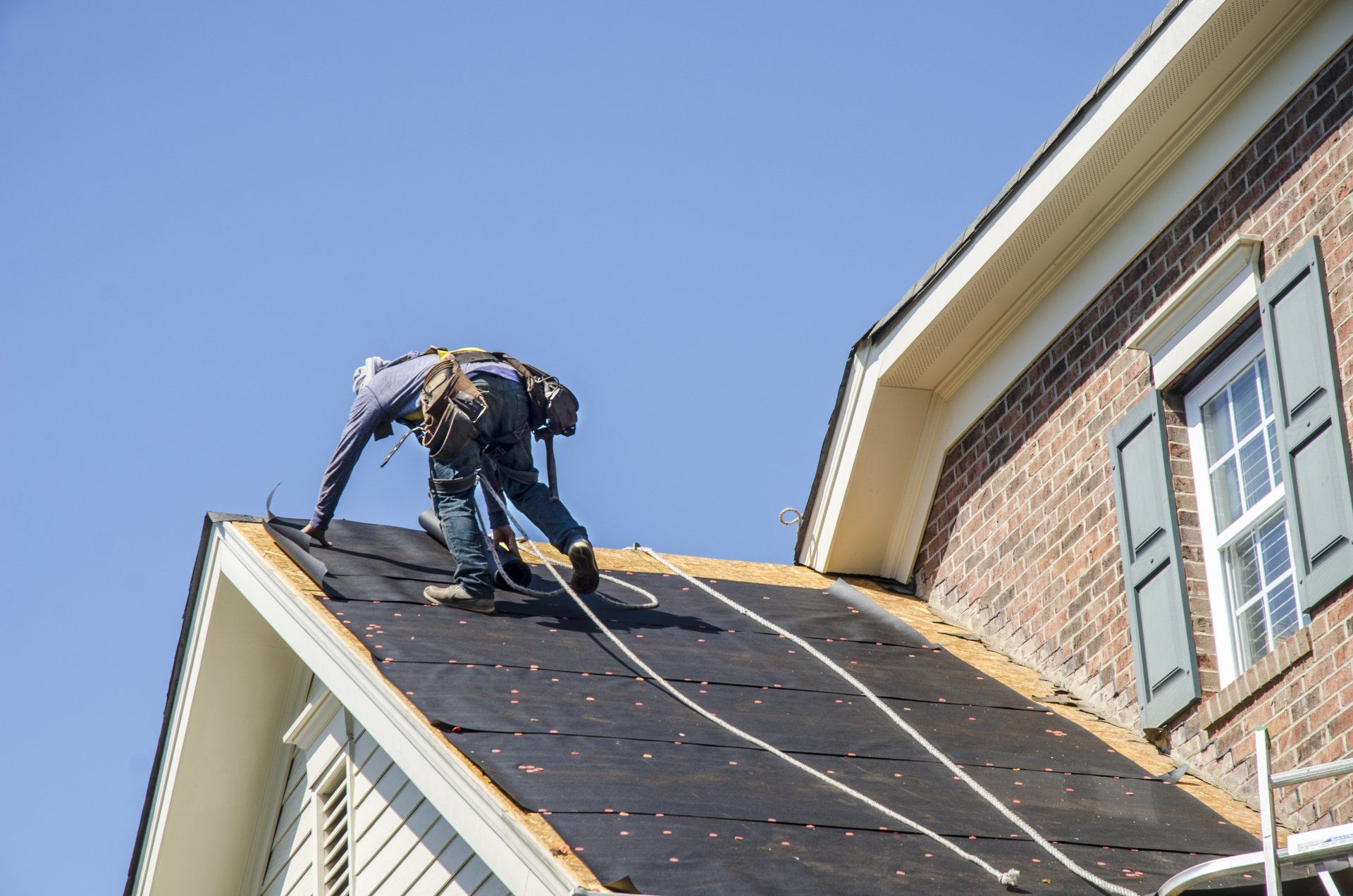 roofing installer using PPE